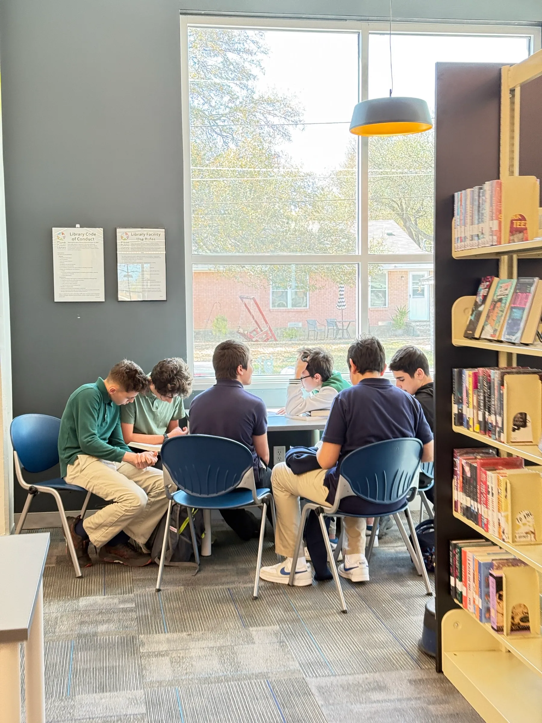 Students studying together at the library
